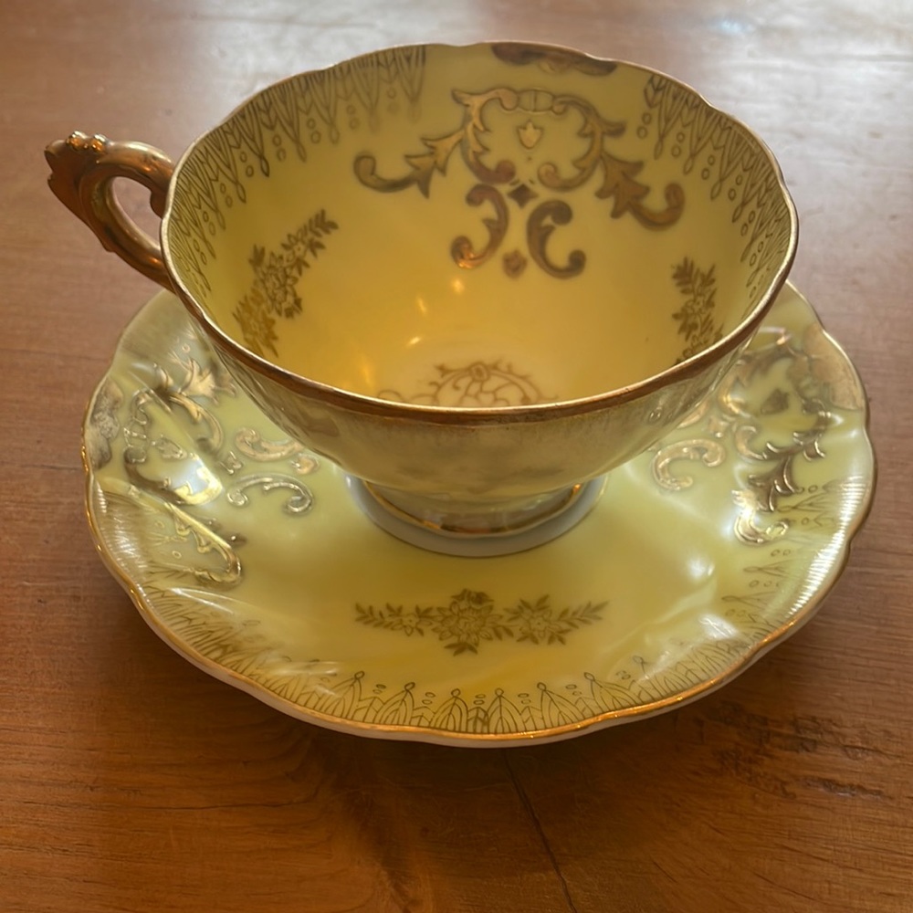 Yellow and Gold Teacup and Saucer